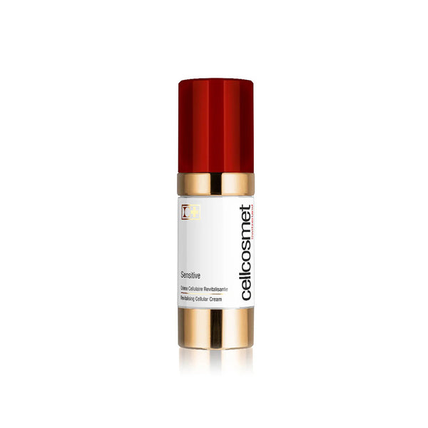 Skincare bottle with red cap and white label on a white background