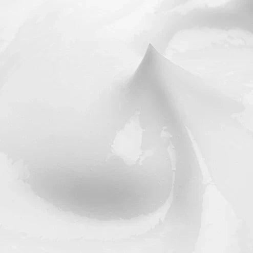Close-up of a white bra on a light gray background