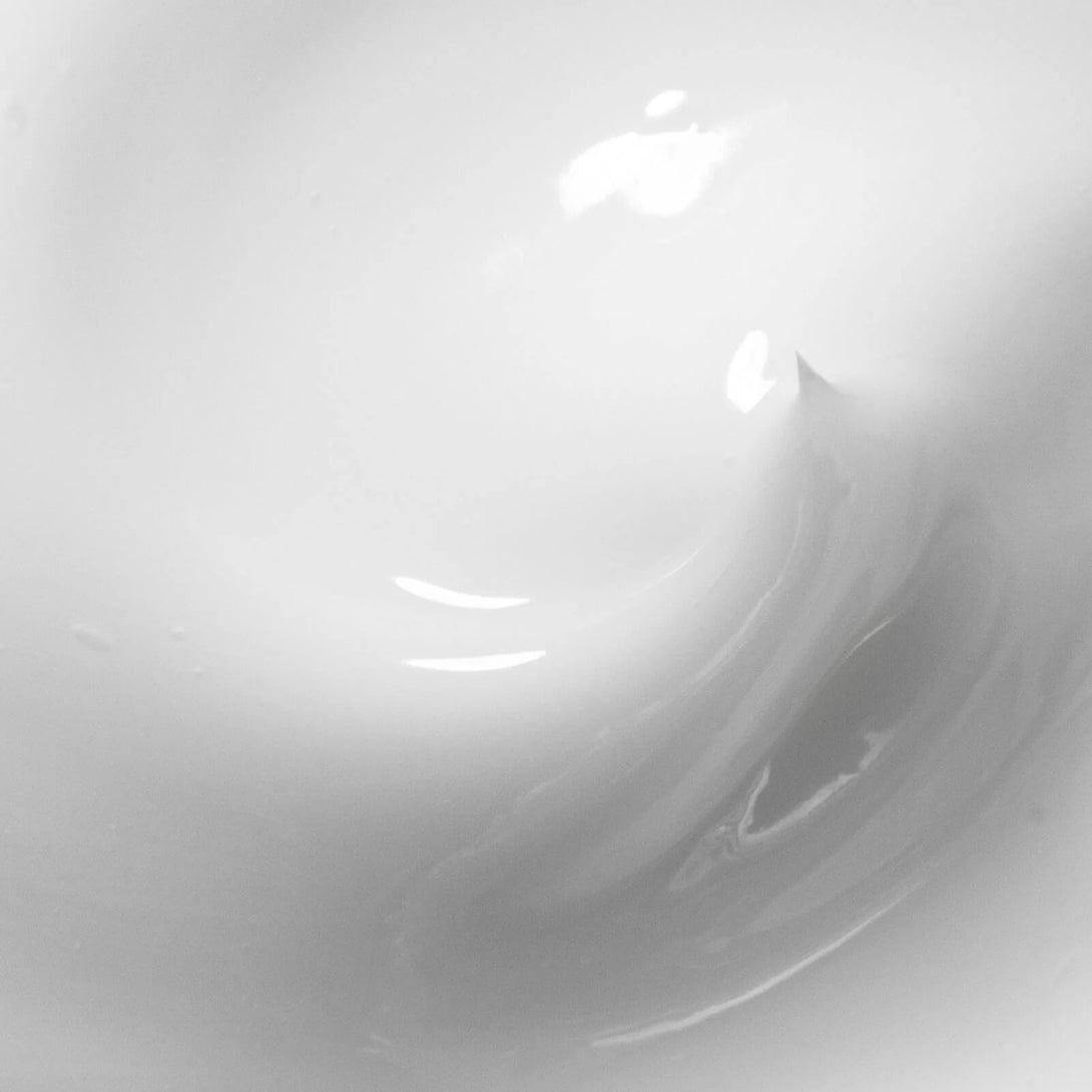 Close-up of a smooth, gray surface with a subtle reflection