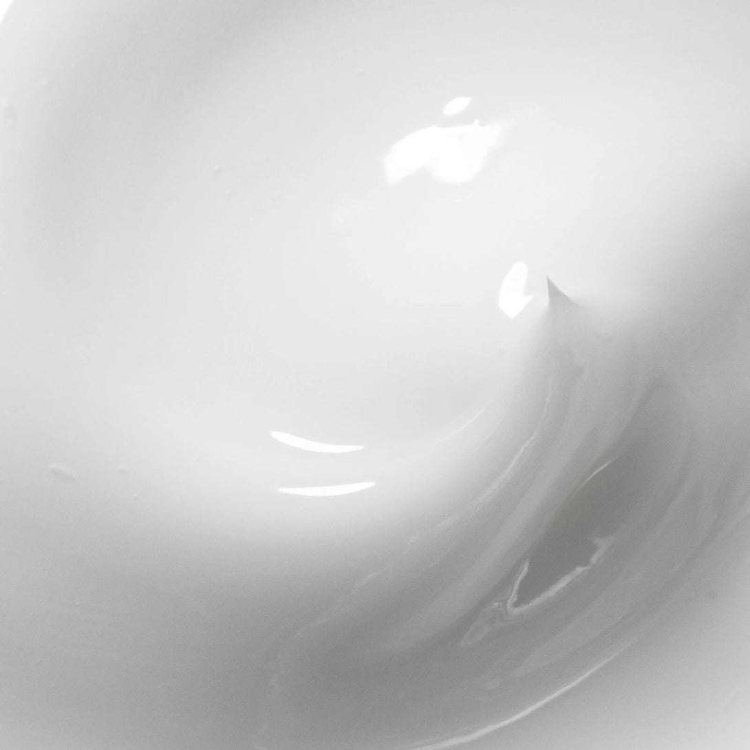 Close-up of a white ceramic bowl with a glossy finish