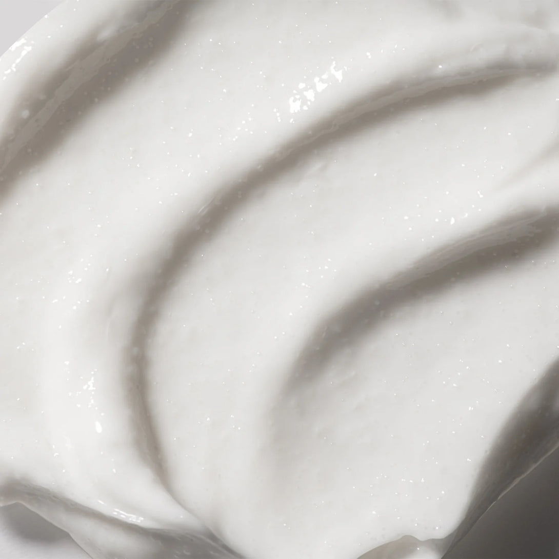 Close-up of white cream or yogurt with a smooth texture