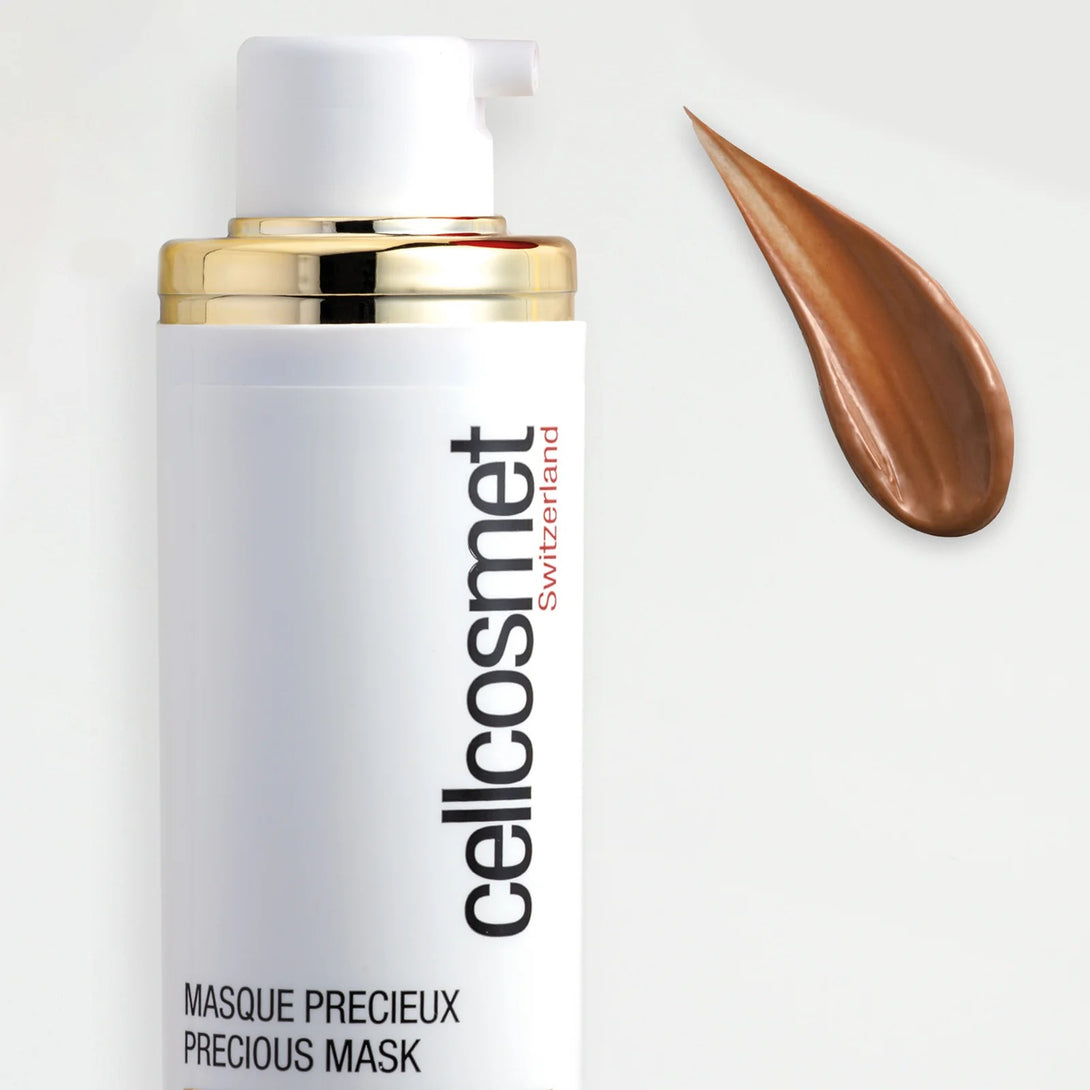 Cellcosmet precious mask bottle with a gold cap on a white background