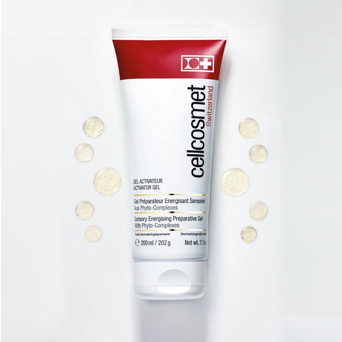 Tube of cellcosmet skincare product on a light gray background