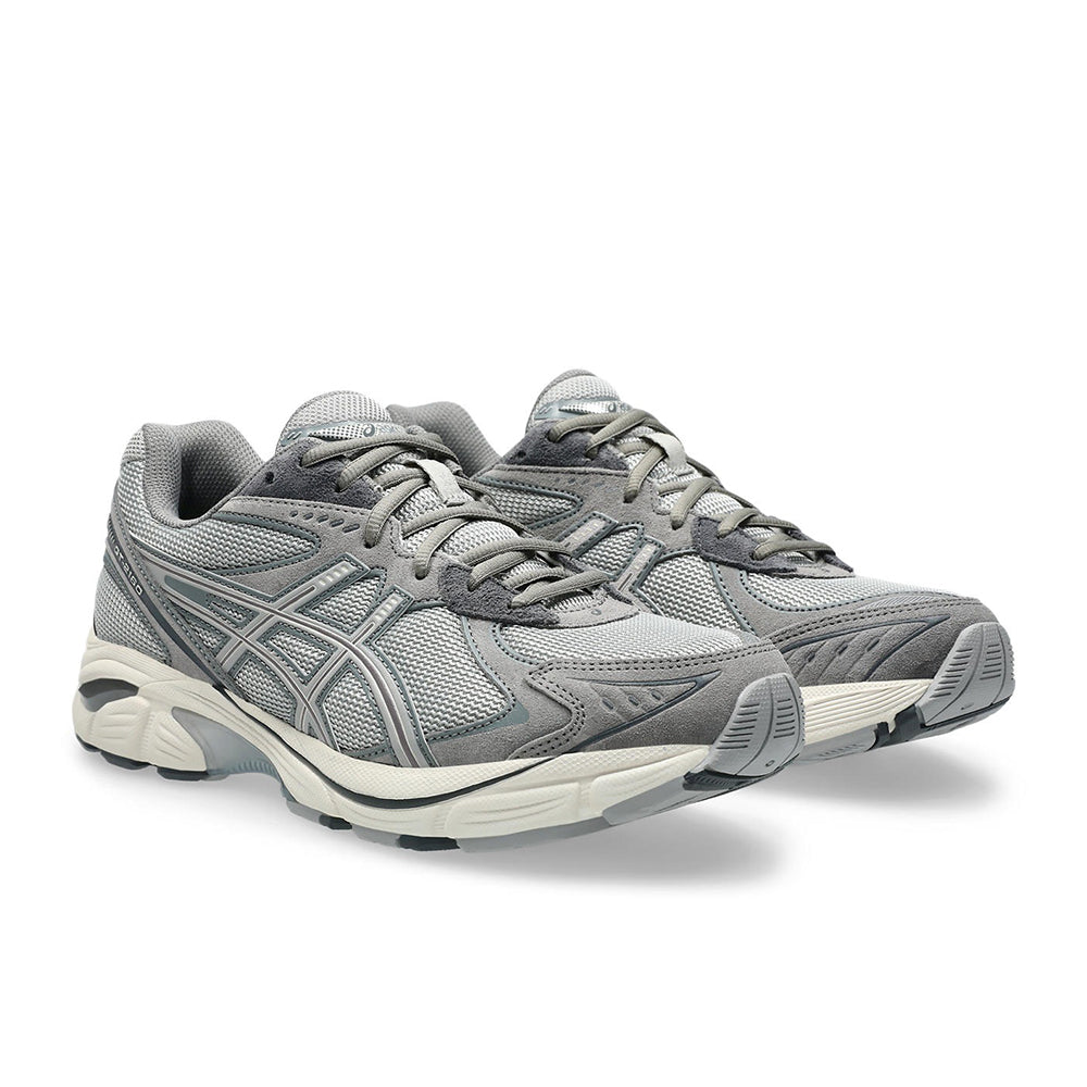 Pair of gray running shoes on a white background