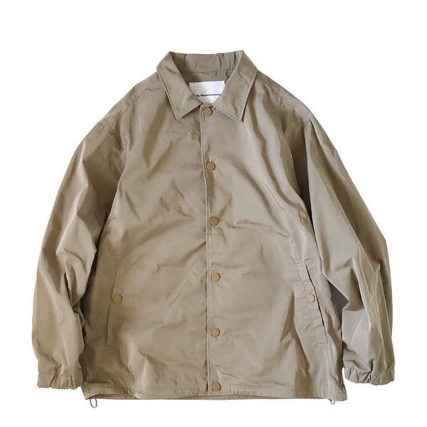 WHITE MOUNTAINEERING WINDSTOPPER CROSS STITCH COACH JACKET