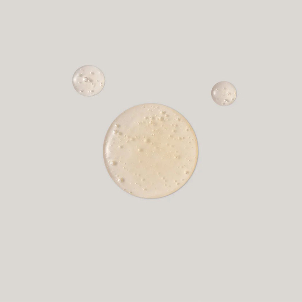 Three round beige objects on a light gray background